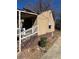 Exterior side of home with a porch, stairs and mature trees at 1292 Lorenzo Sw Dr, Atlanta, GA 30310