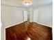 Shows an empty bedroom with hardwood floors and natural light, offering a blank canvas for personalization at 1292 Lorenzo Sw Dr, Atlanta, GA 30310