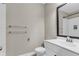 Clean bathroom featuring a white vanity, toilet, and chrome fixtures and towel bars at 1547 Cambridge Pl, Marietta, GA 30062