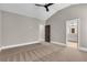Spacious bedroom features neutral walls, plush carpeting, and a ceiling fan at 1547 Cambridge Pl, Marietta, GA 30062