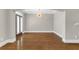Dining room with hardwood floors and a modern chandelier at 1547 Cambridge Pl, Marietta, GA 30062