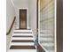 Entryway with hardwood stairs and view of the front door at 1547 Cambridge Pl, Marietta, GA 30062