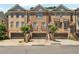 Traditional brick townhome exterior with attached garages, offering classic curb appeal at 1547 Cambridge Pl, Marietta, GA 30062