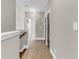 Hallway on the second floor featuring neutral walls and carpet, connecting various rooms at 1547 Cambridge Pl, Marietta, GA 30062