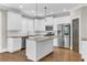 Contemporary kitchen with white cabinetry, stainless steel appliances, granite countertops, and a center island at 1547 Cambridge Pl, Marietta, GA 30062