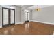 Living room with hardwood floors and French doors at 1547 Cambridge Pl, Marietta, GA 30062