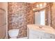 Bathroom with patterned wallpaper, shower, and sink at 1900 Briergate Dr, Duluth, GA 30097