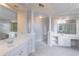Spacious bathroom with dual vanities, columns, and lots of cabinet space at 1900 Briergate Dr, Duluth, GA 30097
