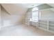 Cozy bedroom with built-in shelves and desk nook under arched window at 1900 Briergate Dr, Duluth, GA 30097