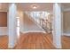 Grand foyer with hardwood floors and a curved staircase at 1900 Briergate Dr, Duluth, GA 30097