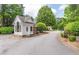 Community entrance gate house with stone accents and manicured landscaping at 1900 Briergate Dr, Duluth, GA 30097