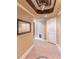 Hallway featuring tile floors, decorative ceiling and an arched door at 1900 Briergate Dr, Duluth, GA 30097