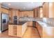 Well-equipped kitchen features stainless steel appliances, a center island, and hardwood floors at 1900 Briergate Dr, Duluth, GA 30097