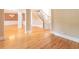 Open living area featuring hardwood floors, staircase and columns at 1900 Briergate Dr, Duluth, GA 30097