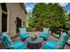 Back deck with ample seating offers a relaxing outdoor space for entertaining at 280 Selkirk Ln, Johns Creek, GA 30097
