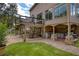 View of the deck overlooking the backyard with an outdoor kitchen at 280 Selkirk Ln, Johns Creek, GA 30097