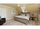 Cozy bedroom featuring a comfortable bed, soft lighting, neutral tones, and an inviting atmosphere at 280 Selkirk Ln, Johns Creek, GA 30097