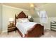 Comfortable bedroom with a queen bed, bedside tables, and a window that provides natural light at 280 Selkirk Ln, Johns Creek, GA 30097