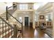 Grand foyer with hardwood floors, staircase, and elegant architectural details at 280 Selkirk Ln, Johns Creek, GA 30097