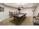 Spacious game room with a ping pong table, cozy seating, and stylish decor, great for entertainment at 280 Selkirk Ln, Johns Creek, GA 30097