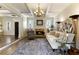 Inviting living room with hardwood floors, stone fireplace, and views to other rooms at 280 Selkirk Ln, Johns Creek, GA 30097