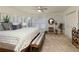 Brightly lit main bedroom with large windows, geometric accent wall, and carpet flooring at 280 Selkirk Ln, Johns Creek, GA 30097