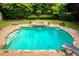 Beautiful pool with a built-in spa and well-maintained patio area at 280 Selkirk Ln, Johns Creek, GA 30097