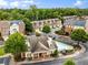 Beautiful aerial view of townhomes with common area pool in a lush green community at 3331 Vintage Se Cir, Smyrna, GA 30080