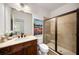 Tastefully designed bathroom features a single sink vanity and glass door shower at 3331 Vintage Se Cir, Smyrna, GA 30080