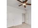 Bright bedroom boasts neutral carpet, a ceiling fan, and two doors at 3331 Vintage Se Cir, Smyrna, GA 30080