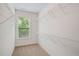 A walk-in closet with white walls, carpet, and shelving is light and bright at 3331 Vintage Se Cir, Smyrna, GA 30080