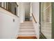 Bright home foyer featuring hardwood floors, a staircase, and natural light at 3331 Vintage Se Cir, Smyrna, GA 30080