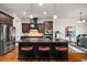Open kitchen featuring a center island, stainless steel appliances, and hardwood floors at 3331 Vintage Se Cir, Smyrna, GA 30080