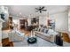 Bright and airy living room with plush seating, a fireplace, and an open layout into the dining area at 3331 Vintage Se Cir, Smyrna, GA 30080