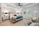 Stylish main bedroom features ample natural light, neutral walls, and tray ceiling at 3331 Vintage Se Cir, Smyrna, GA 30080