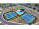 Community aerial view of a pool, tennis courts, playground, and elegant homes at 6125 Langdon Way, Cumming, GA 30028