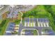 Aerial view highlighting the location of the townhome within the community with lush surroundings at 6125 Langdon Way, Cumming, GA 30028
