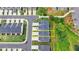 Aerial view displaying the townhome's location within the community with manicured landscaping at 6125 Langdon Way, Cumming, GA 30028