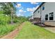 Well-maintained backyard with lush greenery, providing a serene outdoor space at 6125 Langdon Way, Cumming, GA 30028