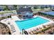 Stunning community pool with ample lounge seating, a covered pavilion, and lush greenery, perfect for relaxation and socializing at 6125 Langdon Way, Cumming, GA 30028