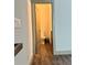Compact half-bathroom with hardwood floors and a neutral color palette, perfect for guests at 1153 Reynolds Square Ln # 16, Atlanta, GA 30307