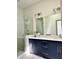 Modern bathroom with double vanity, and glass-enclosed shower at 1153 Reynolds Square Ln # 16, Atlanta, GA 30307