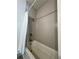 Bathroom featuring a tub with white subway tile and shower at 1153 Reynolds Square Ln # 16, Atlanta, GA 30307