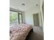 Bright bedroom featuring a door with balcony access and neutral decor at 1153 Reynolds Square Ln # 16, Atlanta, GA 30307