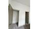 Bedroom featuring a closet and a coordinating gray door at 1153 Reynolds Square Ln # 16, Atlanta, GA 30307