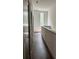 Bright hallway with wood floors and a modern design at 1153 Reynolds Square Ln # 16, Atlanta, GA 30307