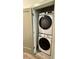 Laundry closet with stacked Samsung washer and dryer at 1153 Reynolds Square Ln # 16, Atlanta, GA 30307
