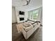 Open-concept living room with modern fireplace and comfortable seating at 1153 Reynolds Square Ln # 16, Atlanta, GA 30307