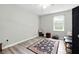 Bedroom with wood floors, rug and a ceiling fan at 18 Amanda Dr, Dallas, GA 30157