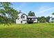 Exterior of home features a spacious backyard at 18 Amanda Dr, Dallas, GA 30157